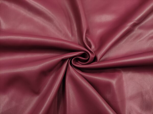 Tessuto Ecopelle per abbigliamento doppiato con camoscio tinta unita cipolla