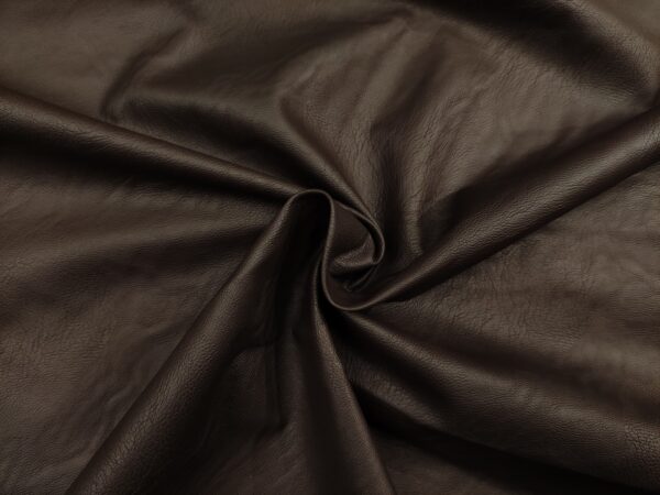Tessuto Ecopelle per abbigliamento tinta unita marrone