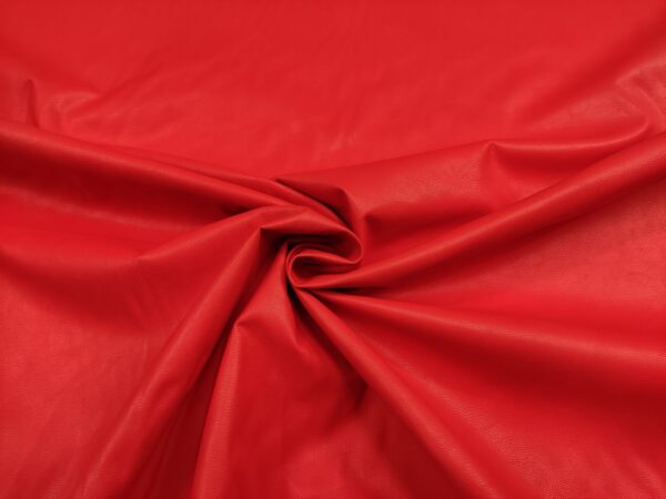 Tessuto Ecopelle per abbigliamento tinta unita rosso