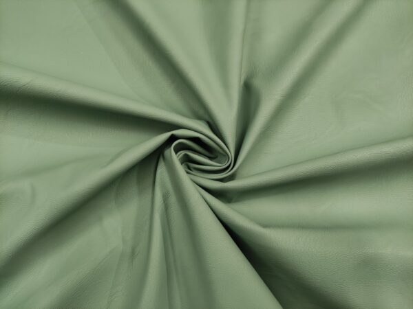 Tessuto Ecopelle per abbigliamento tinta unita verde salvia