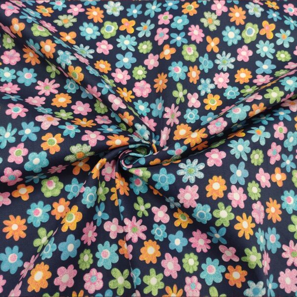 Tessuto Gabardine di Cotone a fantasia motivo floreale blu - arancione - turchese