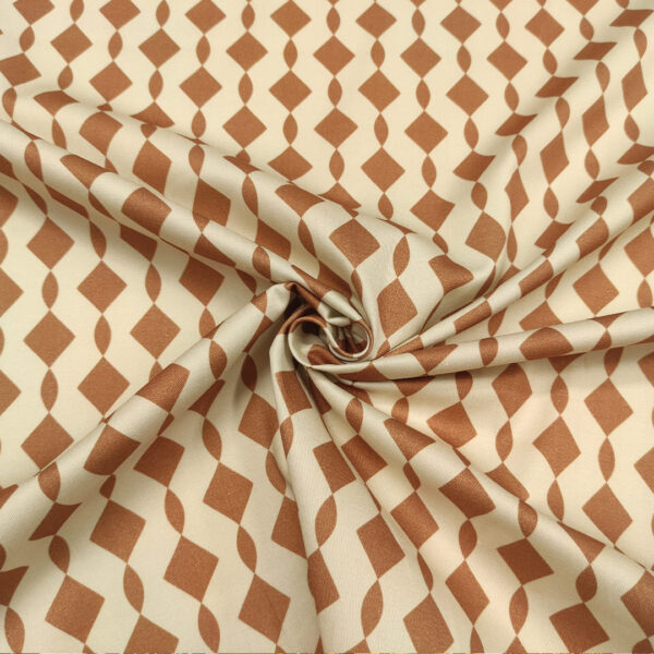Tessuto Gabardine di Cotone a fantasia motivo geometrico tabacco - panna