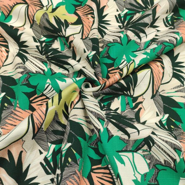 Tessuto Piquet di cotone a fantasia motivo floreale rosa salmone - verde - rosa