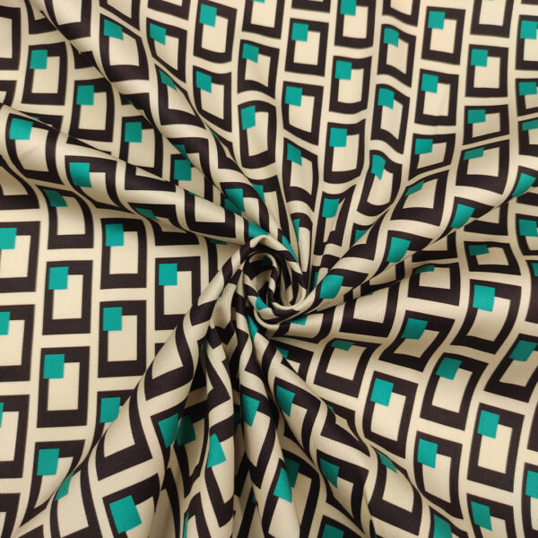 Tessuto Rasatello di cotone a fantasia motivo geometrico nero - beige - verde tiffany