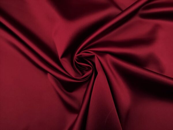 Tessuto Satin leggero elasticizzato tinta unita bordeaux