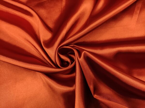 Tessuto Satin leggero elasticizzato tinta unita ruggine