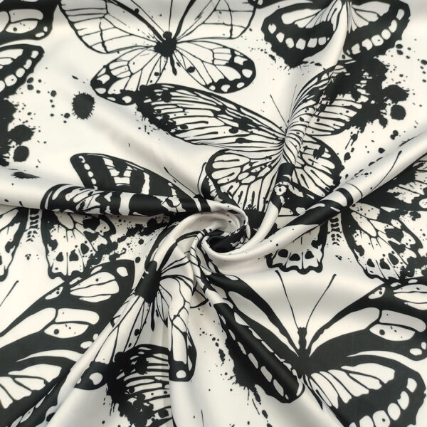 Tessuto Satin a fantasia motivo astratto bianco - nero