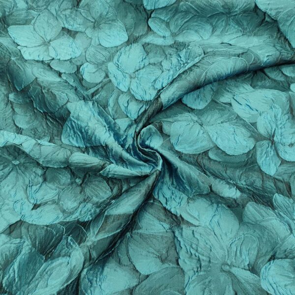 Tessuto Broccato in seta motivo floreale sfumato tono su tono turchese