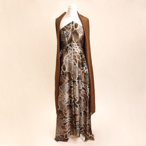 Tessuto simil Dainetto cuoio abbinato a tessuto Cady a fantasia motivo animalier