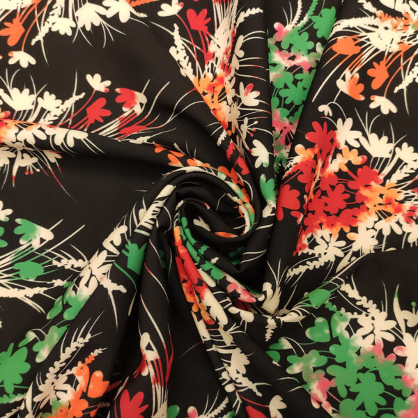 Tessuto cady elasticizzato a fantasia motivo floreale nero - rosso - verde