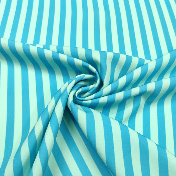 Tessuto Cady elasticizzato a fantasia motivo rigato turchese - verde acqua