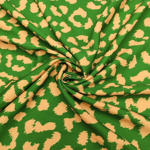 Tessuto Cady elasticizzato a fantasia motivo animalier verde - giallo