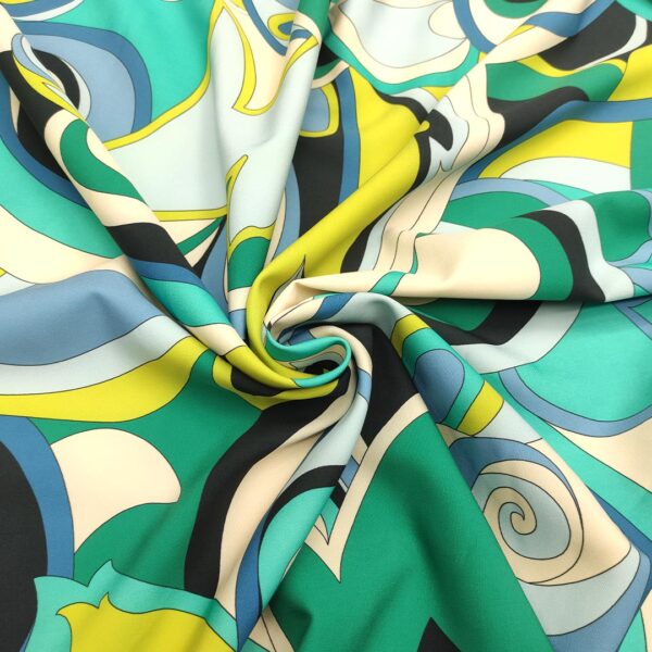 Tessuto Cady elasticizzato a fantasia motivo astratto celeste - lime - tiffany - blu - panna
