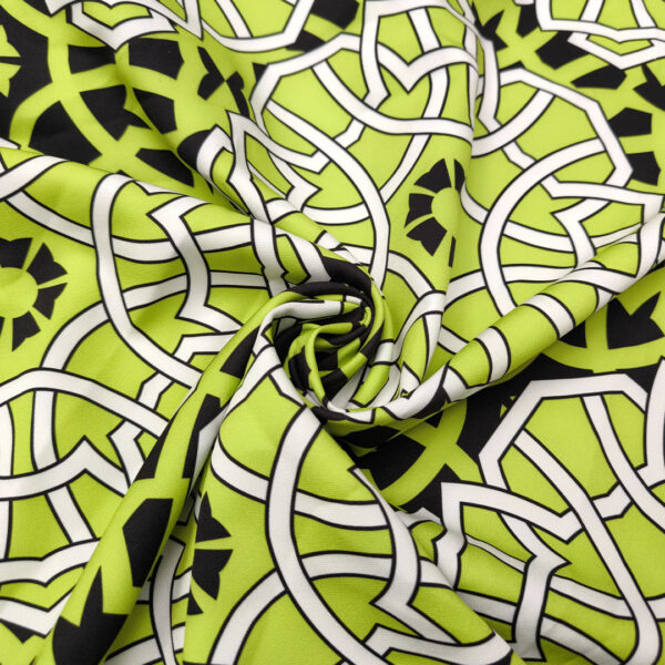 Tessuto Cady elasticizzato a fantasia motivo astratto verde acido - nero - bianco