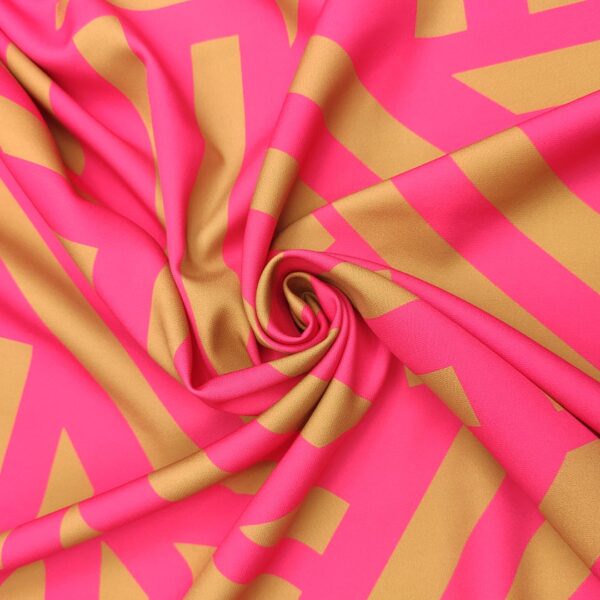 Tessuto Cady elasticizzato a fantasia motivo geometrico fucsia - tabacco