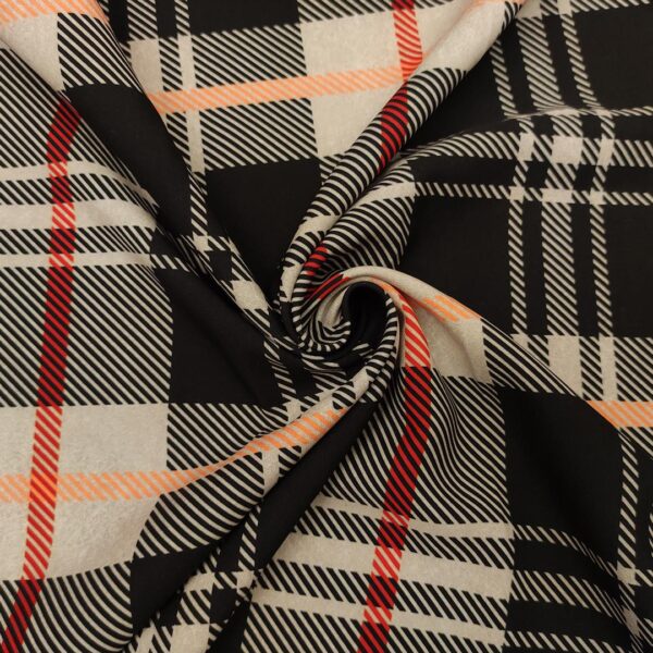 Tessuto Cady elasticizzato a fantasia motivo quadri beige - nero - arancio