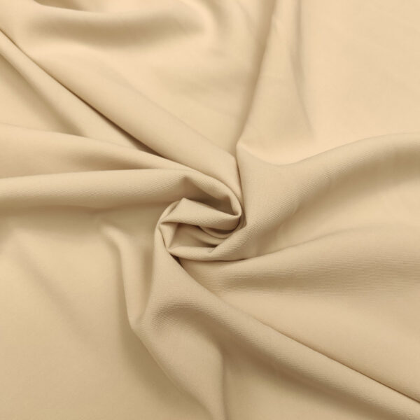 Tessuto Crepe morbido peso autunnale in tinta unita panna