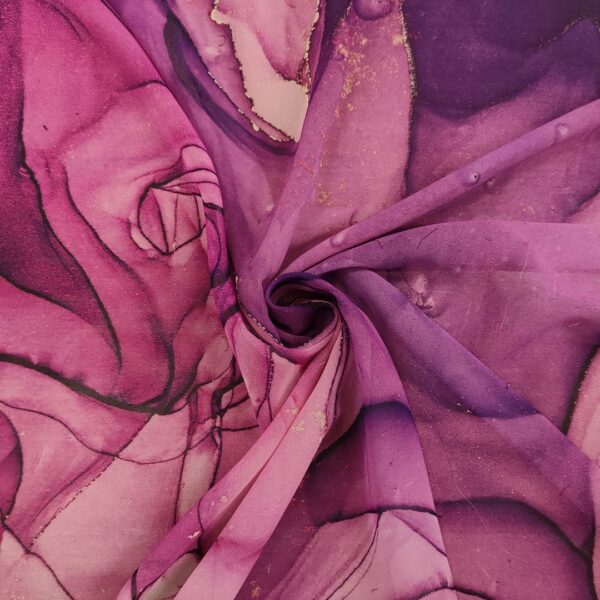 Tessuto Chiffon a fantasia motivo astratto fucsia - viola