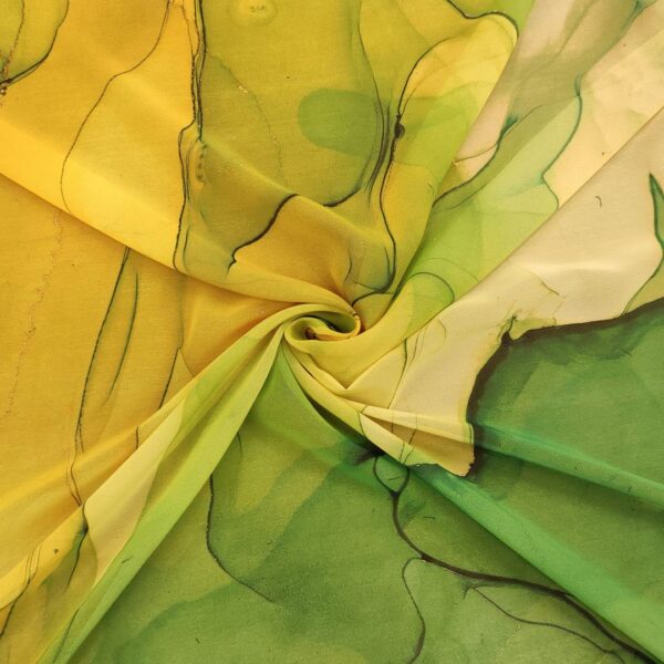 Tessuto Chiffon a fantasia motivo astratto giallo - verde