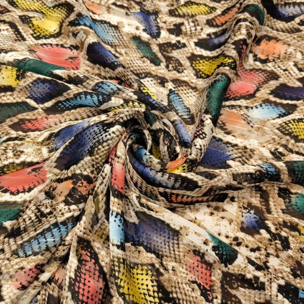 Tessuto Chiffon a fantasia con filo lurex motivo animalier beige - giallo - blu - verde