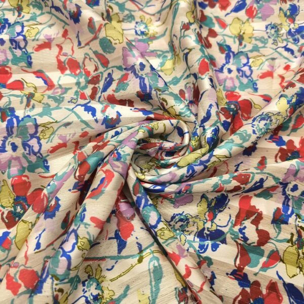 Tessuto Chiffon a fantasia con filo lurex motivo floreale bianco - giallo - rosso - blu elettrico