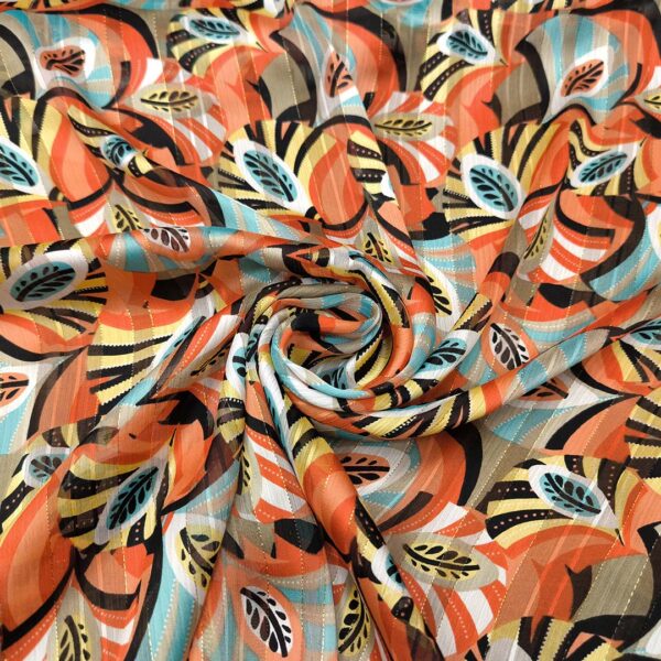 Tessuto Chiffon a fantasia con filo lurex motivo astratto corallo - nero - tiffany - giallo