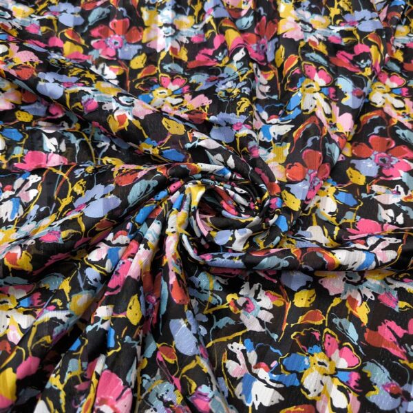 Tessuto Chiffon a fantasia con filo lurex motivo floreale fucsia - celeste - giallo