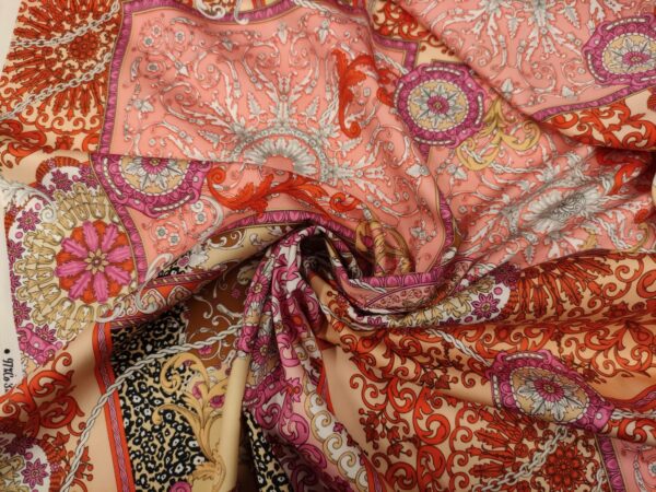 Tessuto Cotone a fantasia motivo floreale barocco corallo - arancione