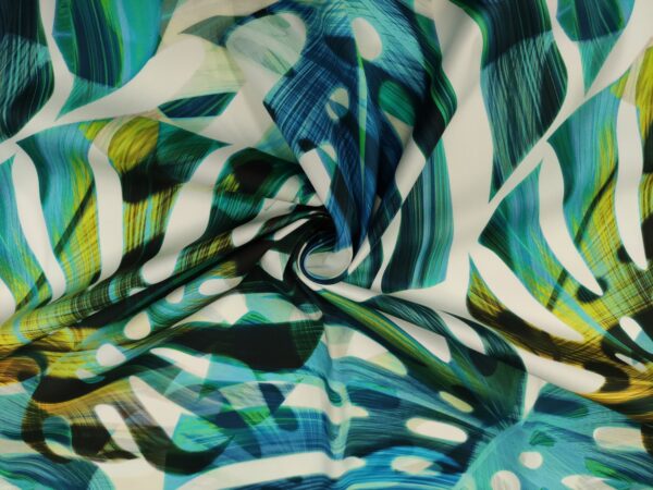 Tessuto Cotone a fantasia motivo floreale palme fondo bianco