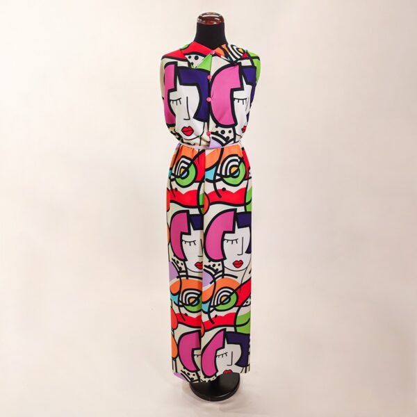 Tessuto Crepe a fantasia motivo astratto bianco - rosso - fucsia