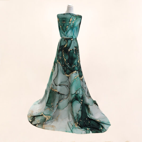 Tessuto Crepe a fantasia motivo astratto verde - oro