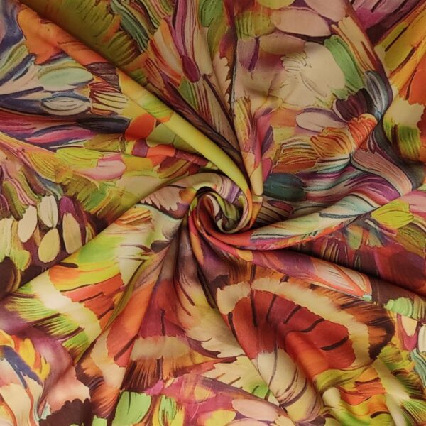 Tessuto Crepe a fantasia motivo floreale arancione - verde - giallo