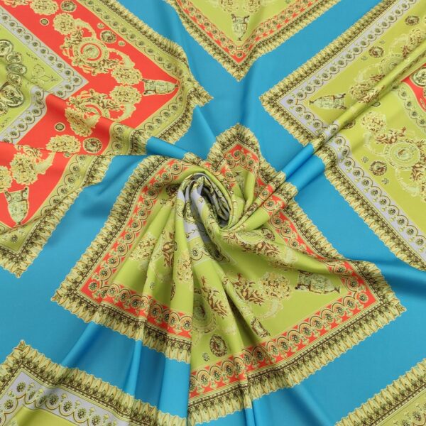 Tessuto Crepe a fantasia motivo floreale barocco celeste - arancione