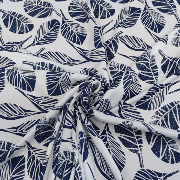 Tessuto Crepe a fantasia motivo floreale blu - bianco