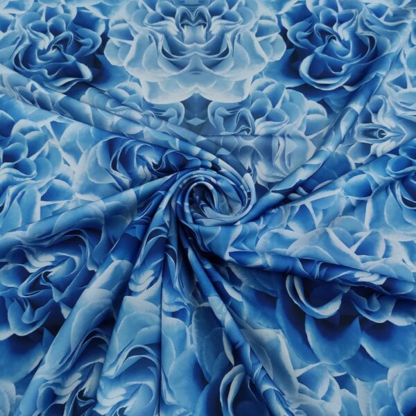 Tessuto Crepe a fantasia motivo floreale azzurro - celeste - blu