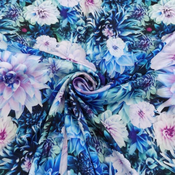 Tessuto Crepe a fantasia motivo floreale lilla - blu - celeste