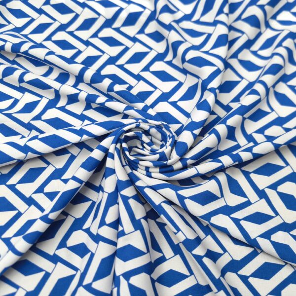 Tessuto Crepe a fantasia motivo geometrico blu elettrico - bianco