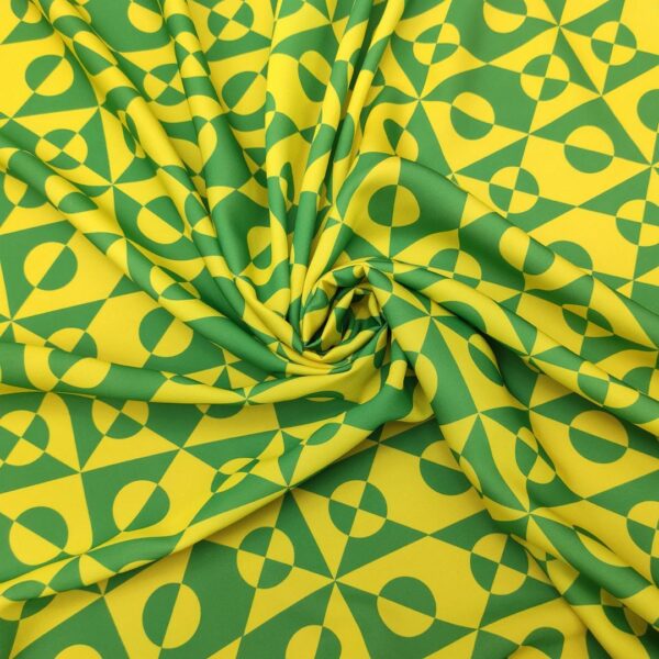 Tessuto Crepe a fantasia motivo geometrico verde prato - giallo