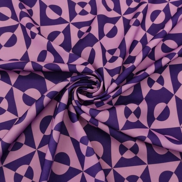 Tessuto Crepe a fantasia motivo geometrico viola - glicine