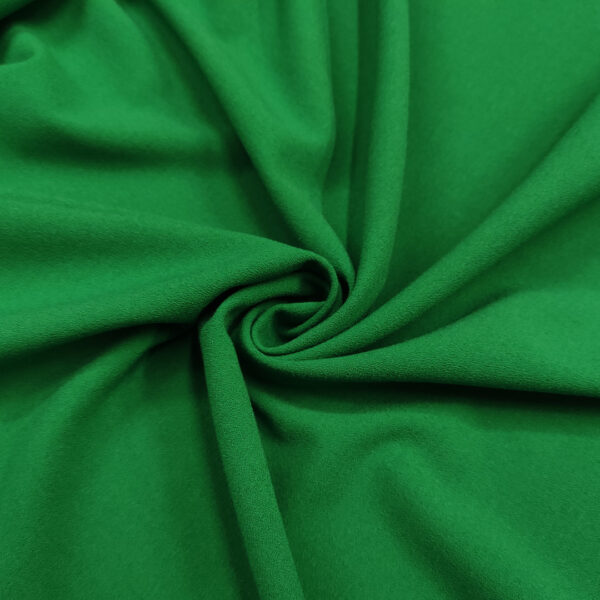 Tessuto Crepe morbido peso autunnale in tinta unita verde prato