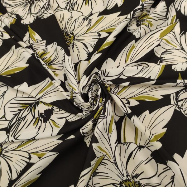 Tessuto Crepe elasticizzato a fantasia motivo floreale bianco - nero - verde