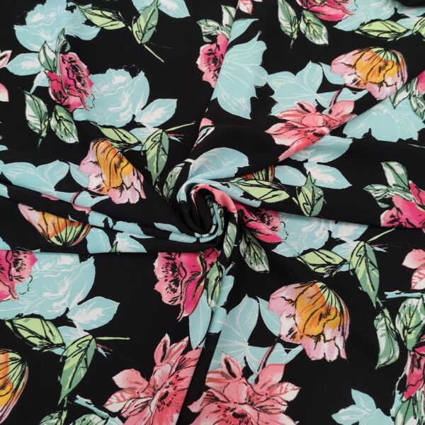 Tessuto Crepe elasticizzato a fantasia motivo floreale nero - celeste - rosa - arancione