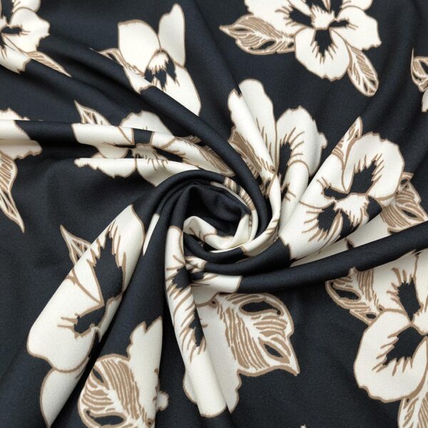 Tessuto Crepe elasticizzato a fantasia motivo floreale nero - beige