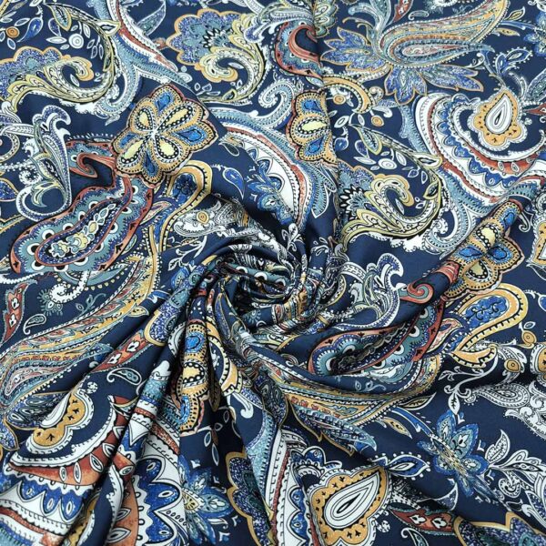 Tessuto Crepe a fantasia motivo floreale cashmere verde - blu - ocra