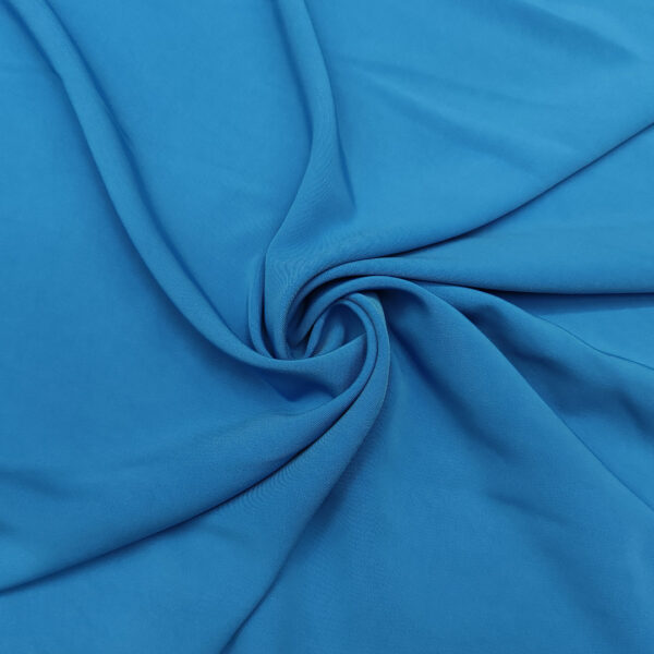 Tessuto Crepe morbido Elegance tinta unita azzurro