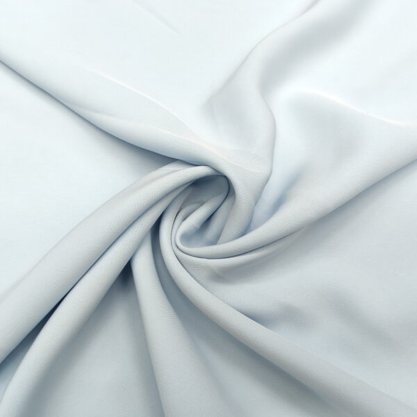 Tessuto Crepe morbido in tinta unita celeste polvere