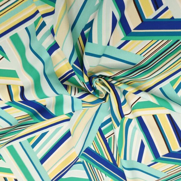 Tessuto Crepe a fantasia motivo geometrico blu royale - tiffany - smeraldo - giallo