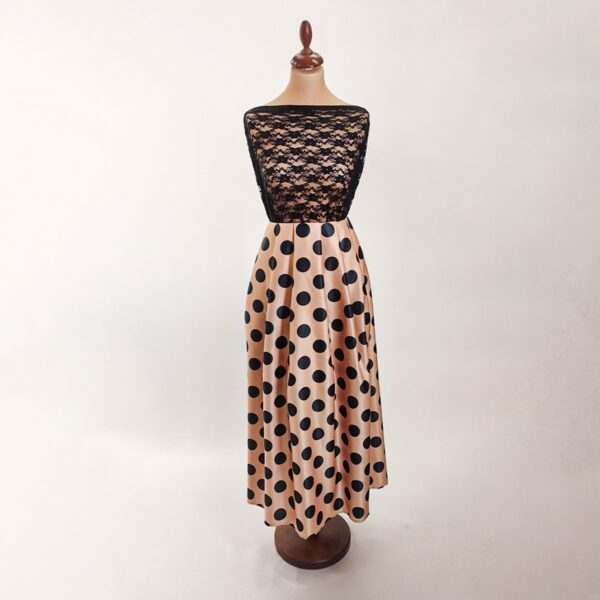 Tessuto Duchesse a fantasia motivo pois beige nero abbinato a Tessuto Pizzo elasticizzato nero