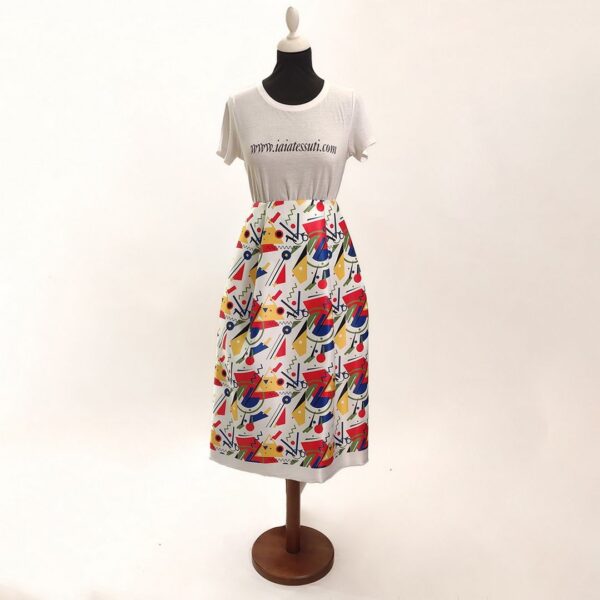 Tessuto Duchesse a fantasia motivo astratto bianco - blu - rosso - giallo