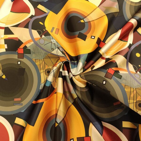 Tessuto Duchesse a fantasia motivo geometrico ocra - giallo - blu - grigio